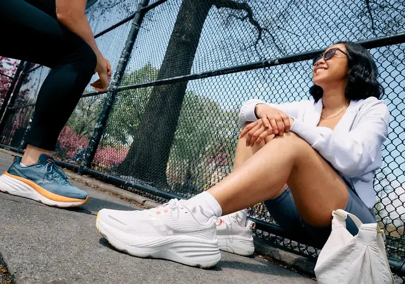 Two-women-wearing-saucony-running-shoes.webp
