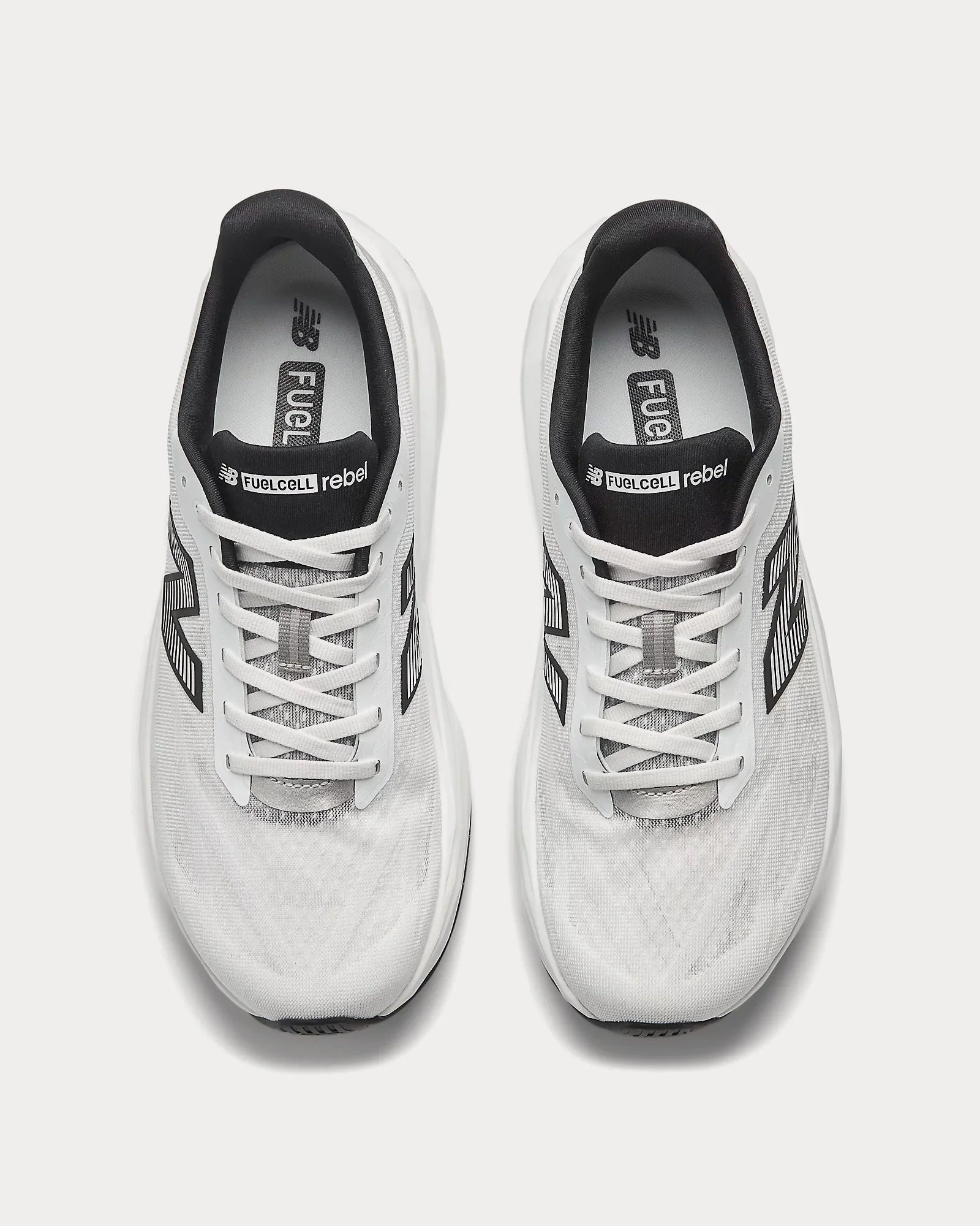 new-balance-FuelCellRebelv5-WhitewithBlackandSilverMetallic-running-shoes-trainers-2_1600x2000_0e74987a-2038-40f8-a36a-6f848a120f13.webp